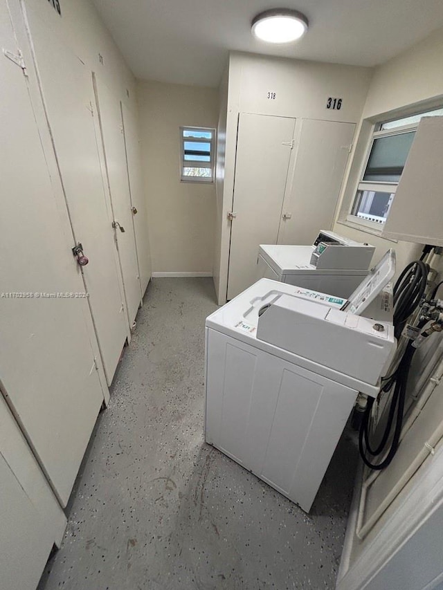 washroom featuring independent washer and dryer