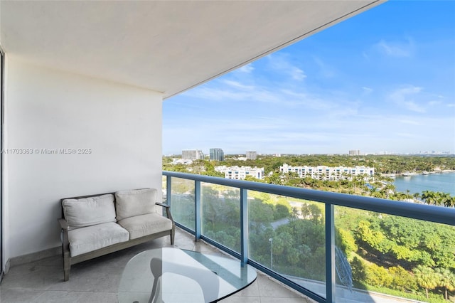 balcony featuring a water view