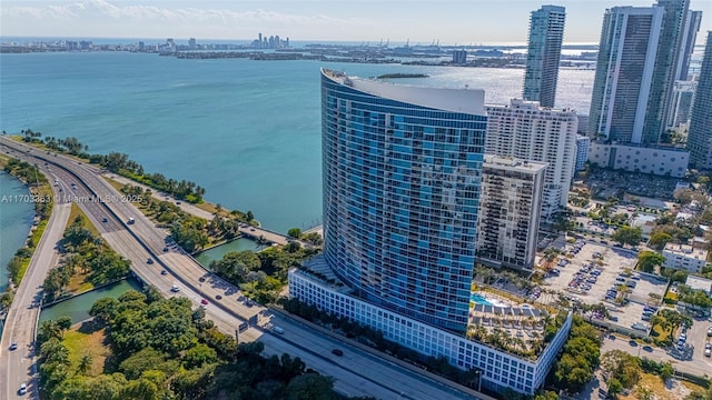 birds eye view of property featuring a water view