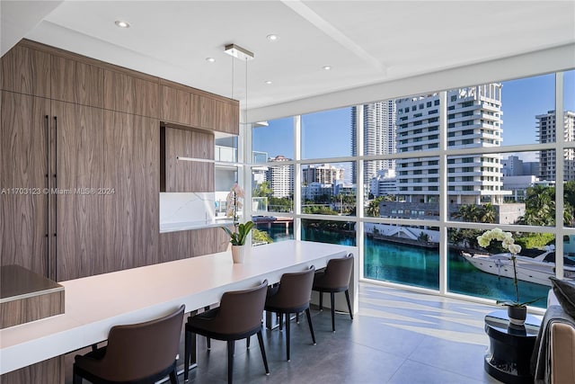 dining space with a water view