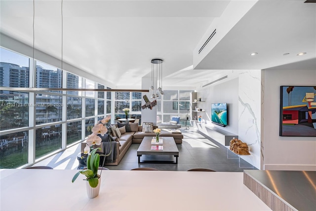 living room featuring a wealth of natural light