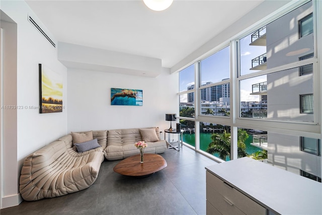 living room featuring a water view