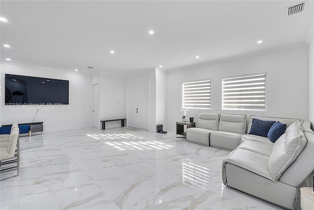 living room featuring crown molding