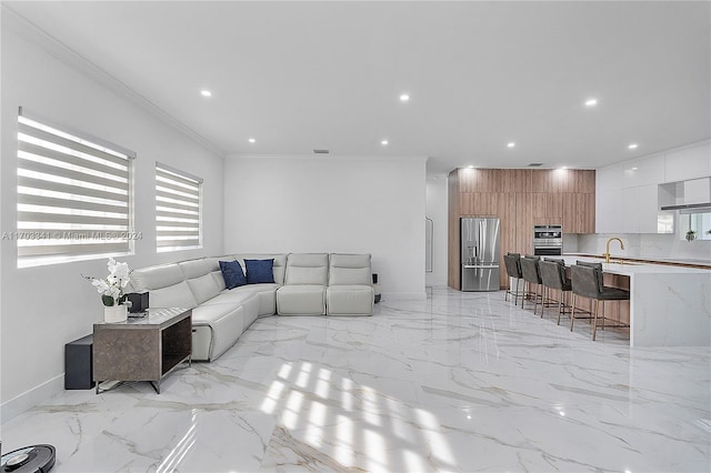 living room with crown molding