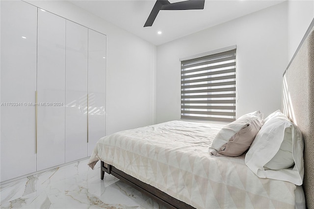 bedroom with a closet and ceiling fan