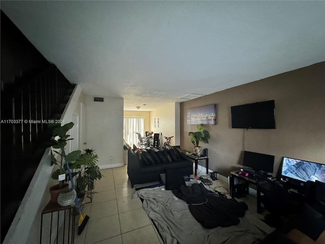 living room featuring light tile patterned flooring