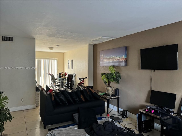 living room with light tile patterned floors