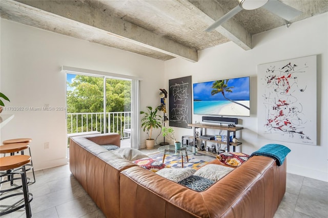 living room with ceiling fan and light tile patterned flooring