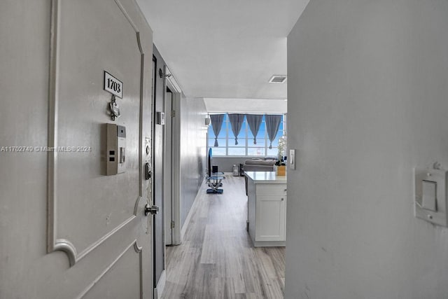 hall featuring light hardwood / wood-style flooring