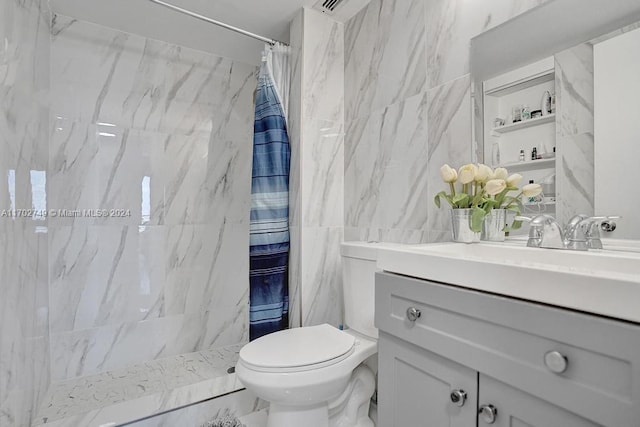 bathroom with curtained shower, vanity, tile walls, and toilet