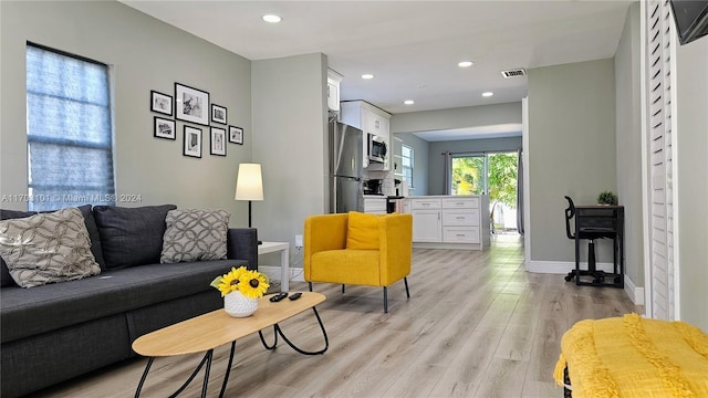 living room featuring light hardwood / wood-style flooring