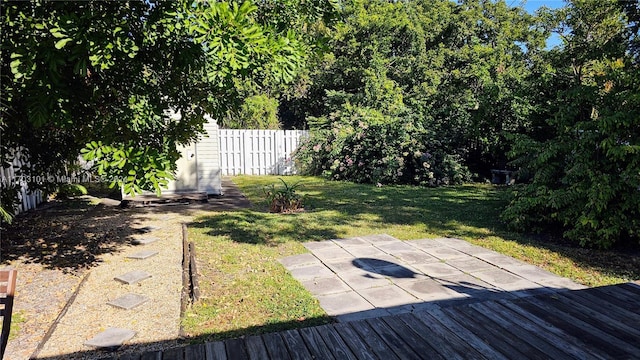 view of yard with a wooden deck