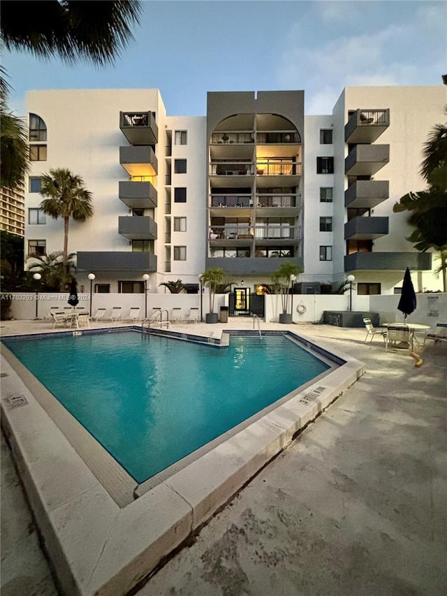 view of pool featuring a patio area