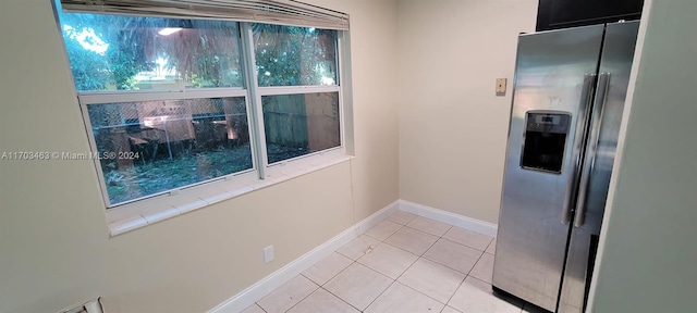 view of tiled spare room