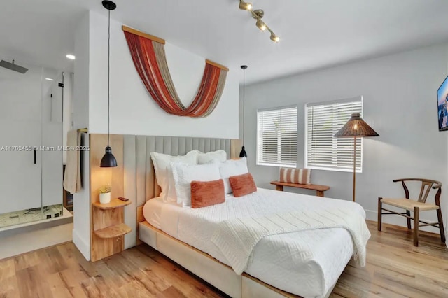 bedroom featuring hardwood / wood-style flooring