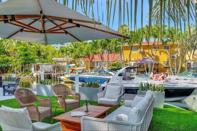 view of patio featuring an outdoor hangout area and a water view