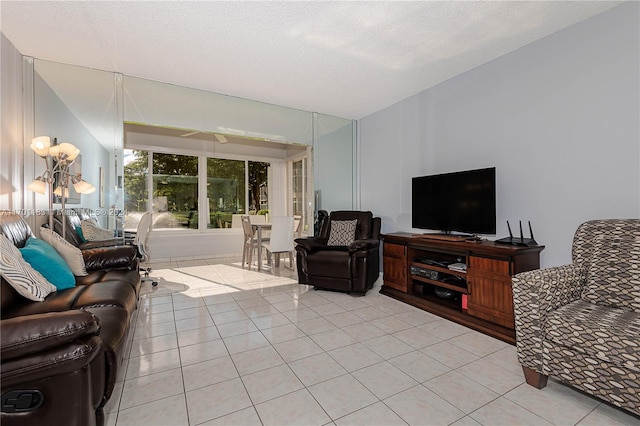 tiled living room with a textured ceiling