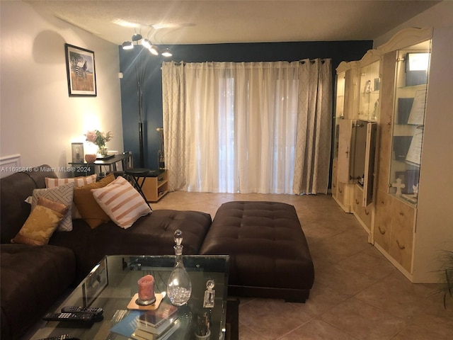 living room with tile patterned flooring