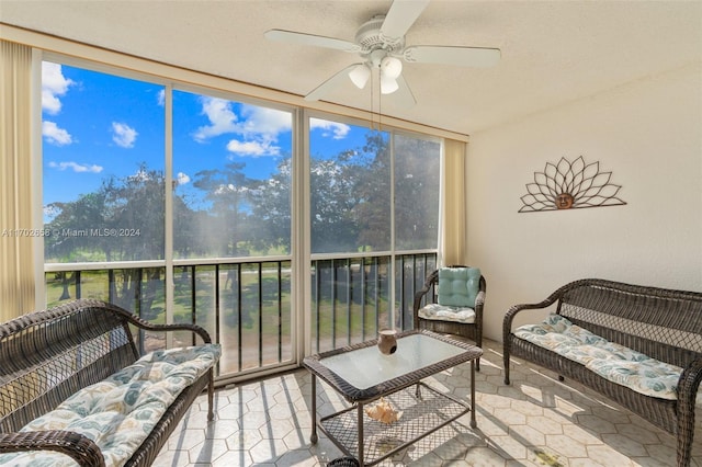 sunroom / solarium with ceiling fan and plenty of natural light