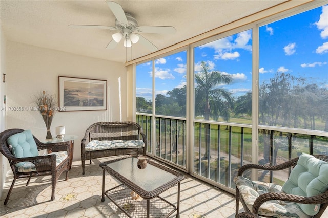 sunroom / solarium with ceiling fan