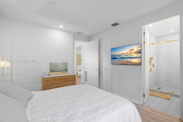 bedroom with light wood-type flooring