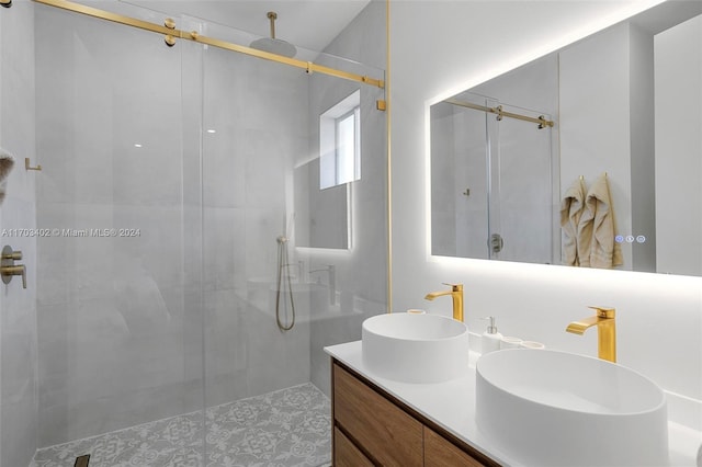 bathroom with vanity and an enclosed shower