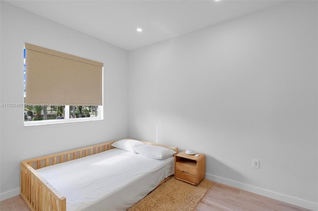 bedroom featuring light wood-type flooring