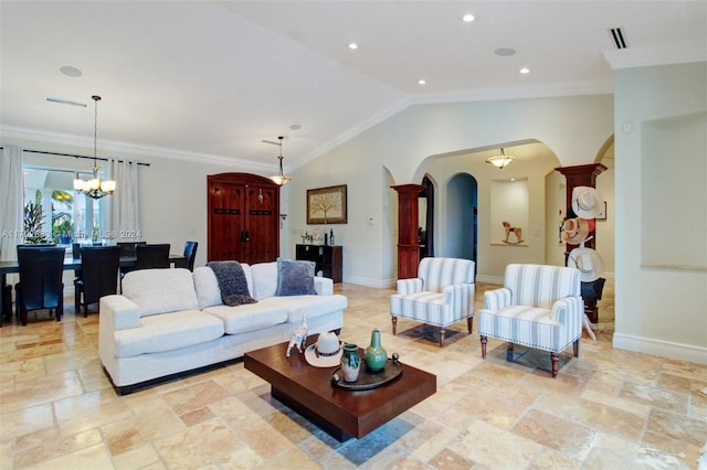 living room featuring ornamental molding, lofted ceiling, and a notable chandelier