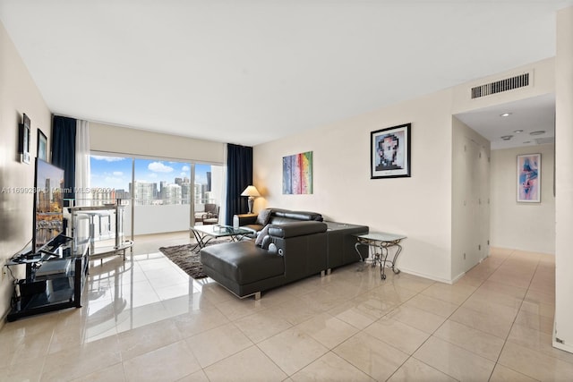 living room featuring light tile patterned flooring