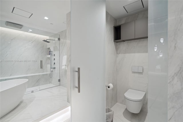 bathroom with plus walk in shower, tile walls, and toilet