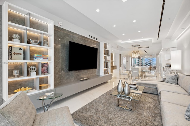 living room featuring a chandelier