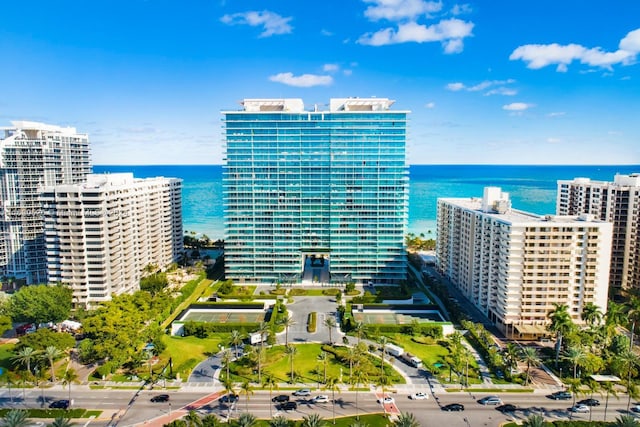 birds eye view of property featuring a water view