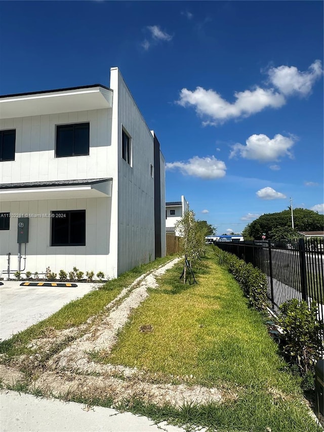 view of home's exterior featuring a yard