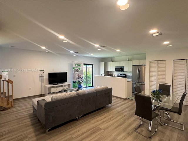 living room featuring light wood-type flooring