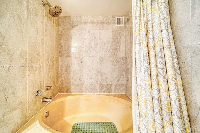 bathroom featuring shower / tub combo