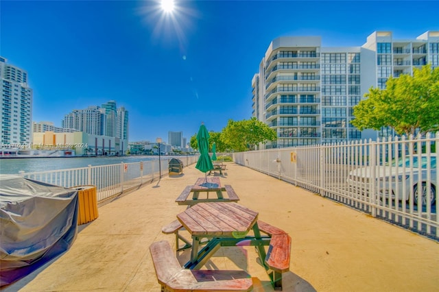 view of home's community with a water view