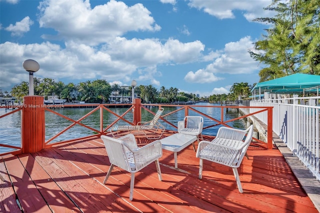 wooden terrace with a water view