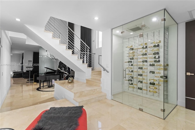 wine area featuring tile patterned floors