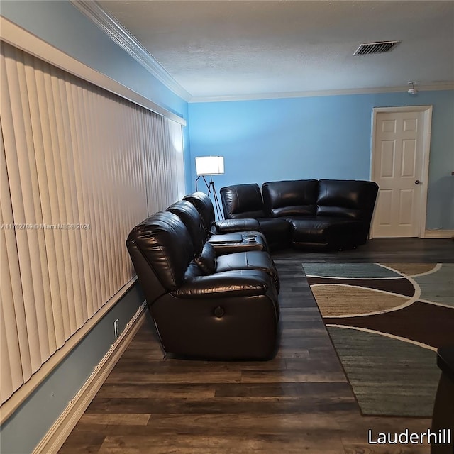 living room with crown molding and dark hardwood / wood-style floors