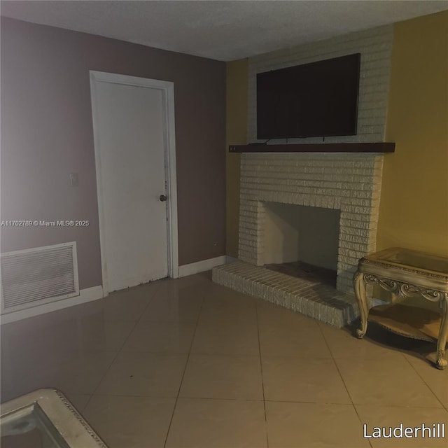 tiled living room featuring a fireplace