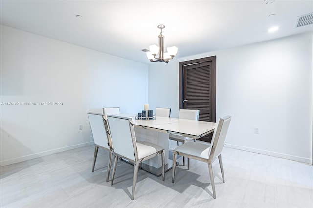 dining room with an inviting chandelier