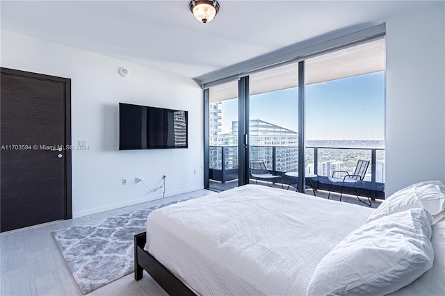 1000 Brickell Plz Unit 3806, Miami, FL 33131 - bedroom with floor to ceiling windows and multiple windows
