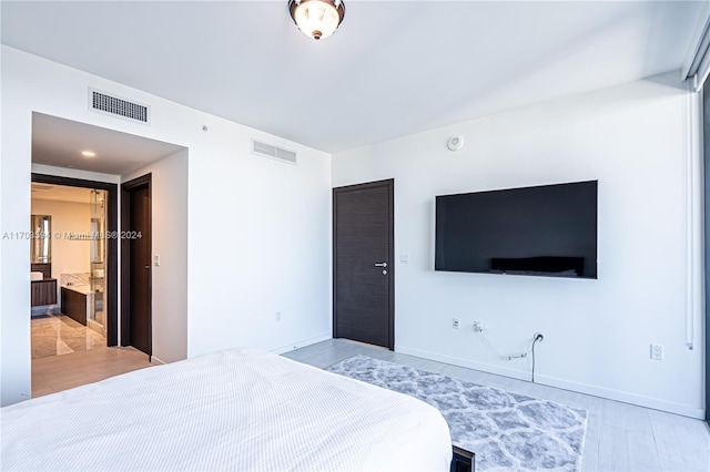 1000 Brickell Plz Unit 3806, Miami, FL 33131 - bedroom featuring wood finished floors and baseboards