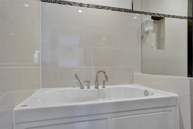 bathroom featuring a tub