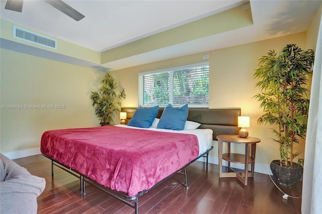 bedroom with hardwood / wood-style flooring and ceiling fan