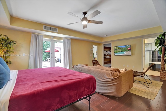 bedroom with access to exterior, french doors, dark hardwood / wood-style floors, and ceiling fan