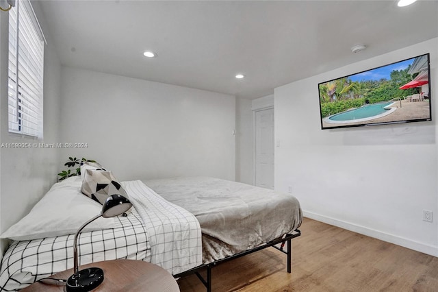 bedroom featuring light wood-type flooring