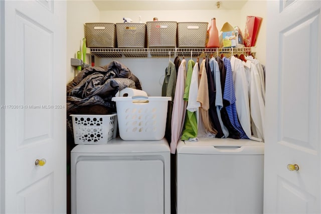 clothes washing area with washing machine and clothes dryer