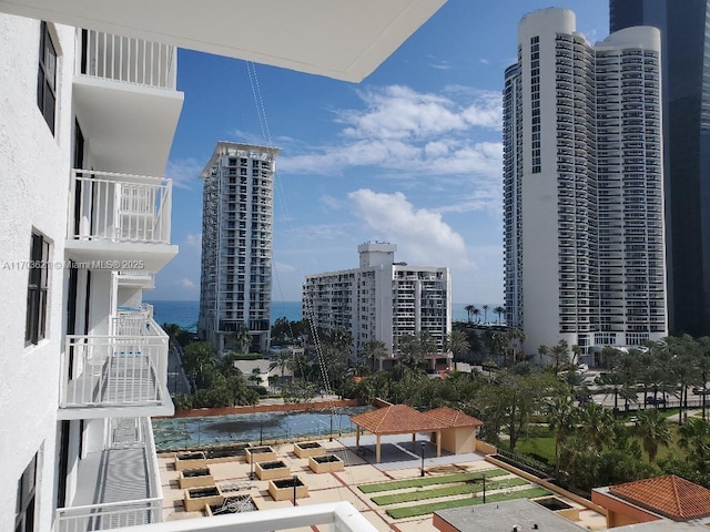 property's view of city featuring a water view