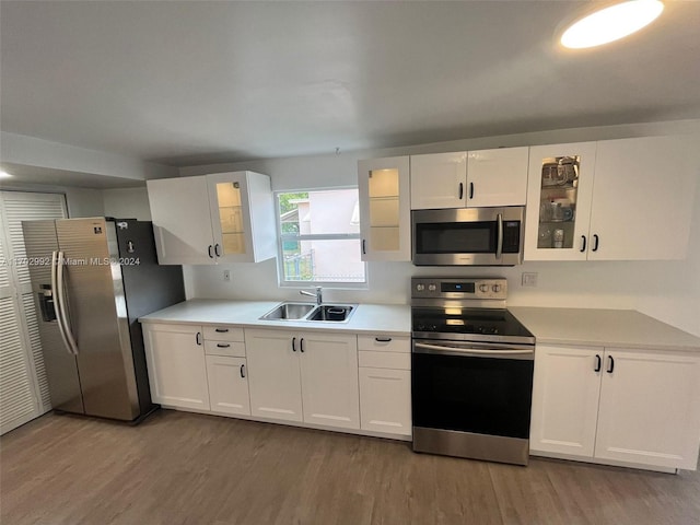 kitchen with white cabinets and stainless steel appliances